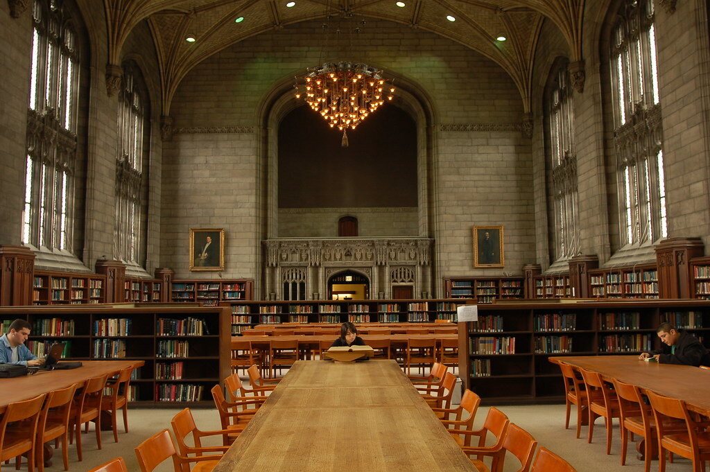Students studying in a university library